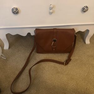 Crossbody brown purse with gold hardware